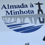 Almada à Minhota Logo